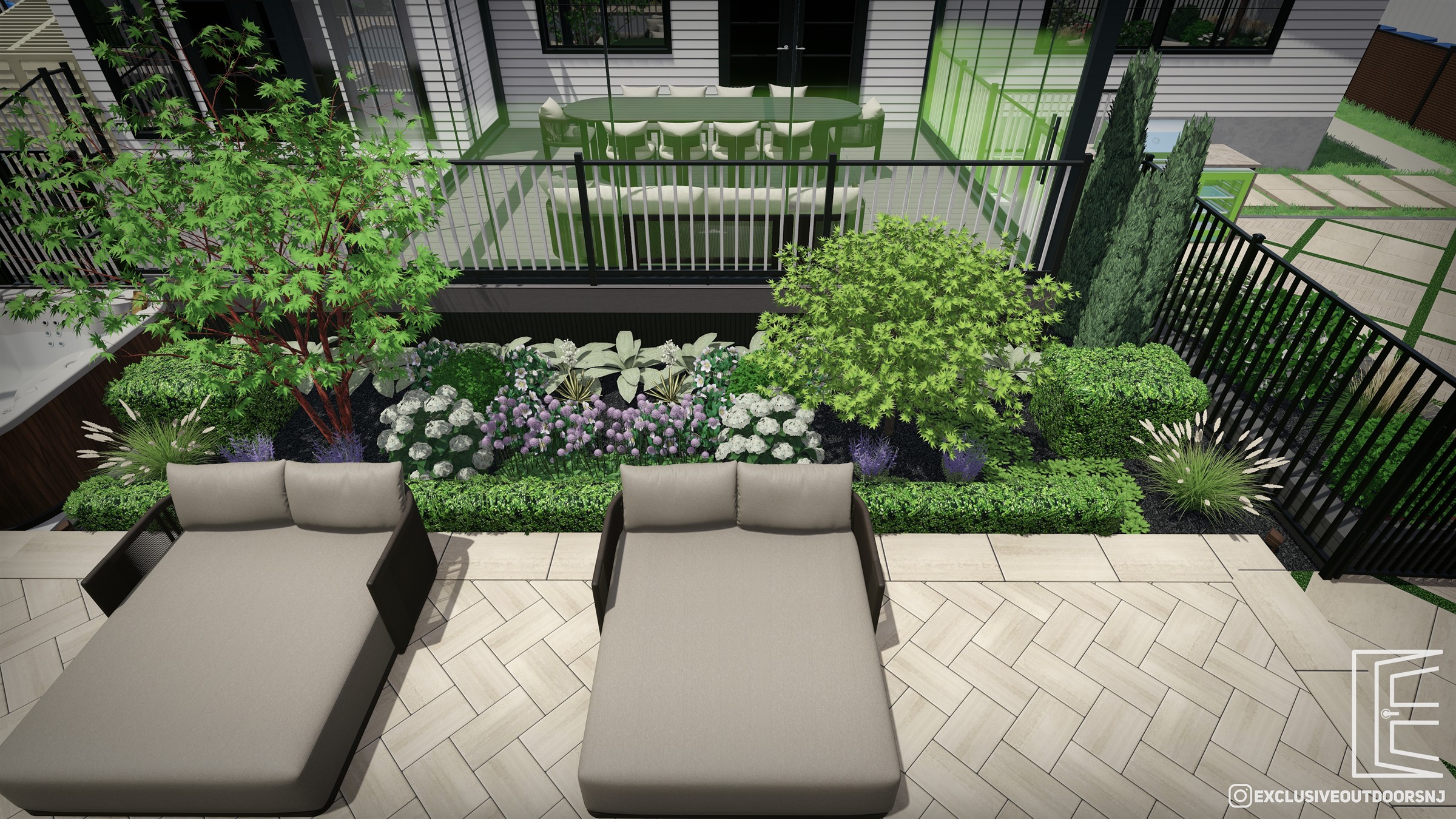 Poolside lounge chairs beside layered planting